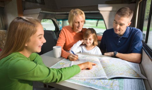 Family looking at map
